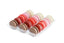 Assorted macarons in a clear plastic container on a white background
